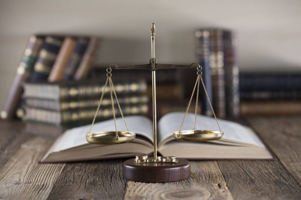 Scales and Book Photo of Scales and Book